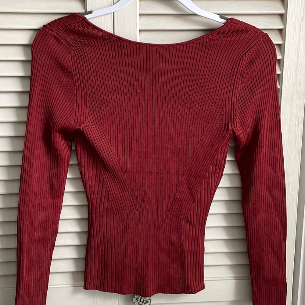 Fitted, rust colored low back top. New with tags.